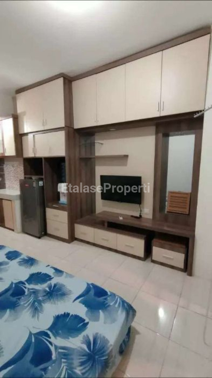 Foto properti Jual Cepat Apartemen Puncak Dharmahusada Studio Full Furnish 1