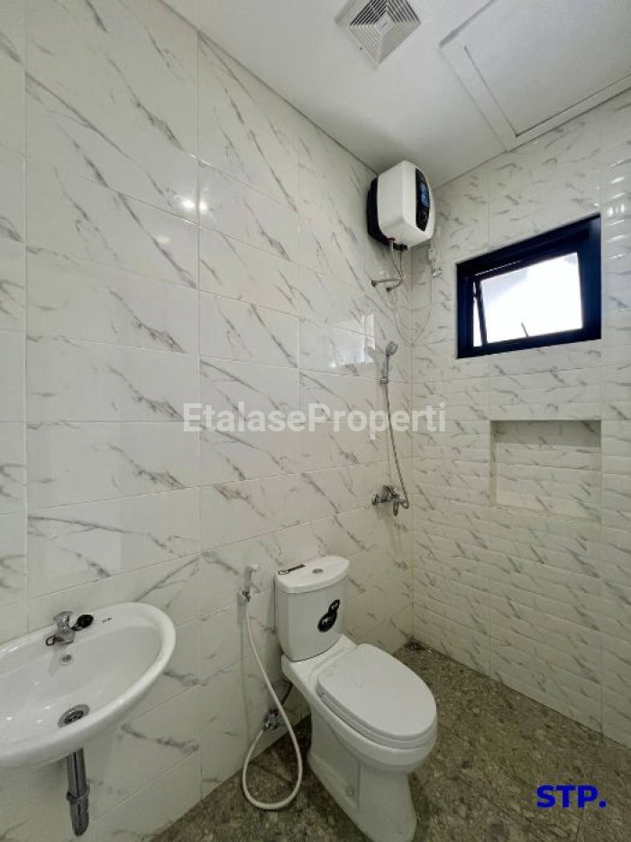 Foto properti Rumah Minimalis Kutisari Indah Utara ROW LEBAR 9