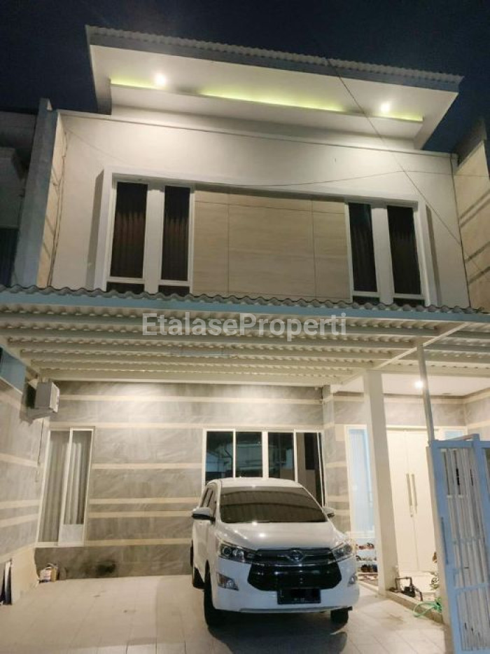 Foto properti Dijual Rumah Modern Minimalis 2 Lt Sutorejo Utara 1