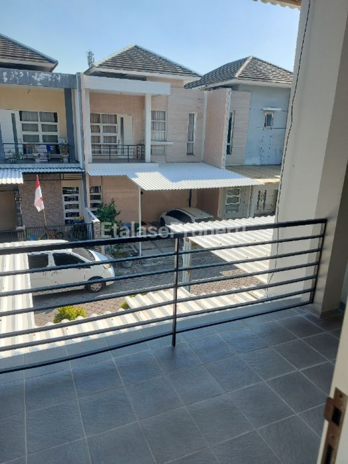 Foto properti Dijual Rumah Strategis Full Furnished 2 Lt Dharma Indah Regency 3
