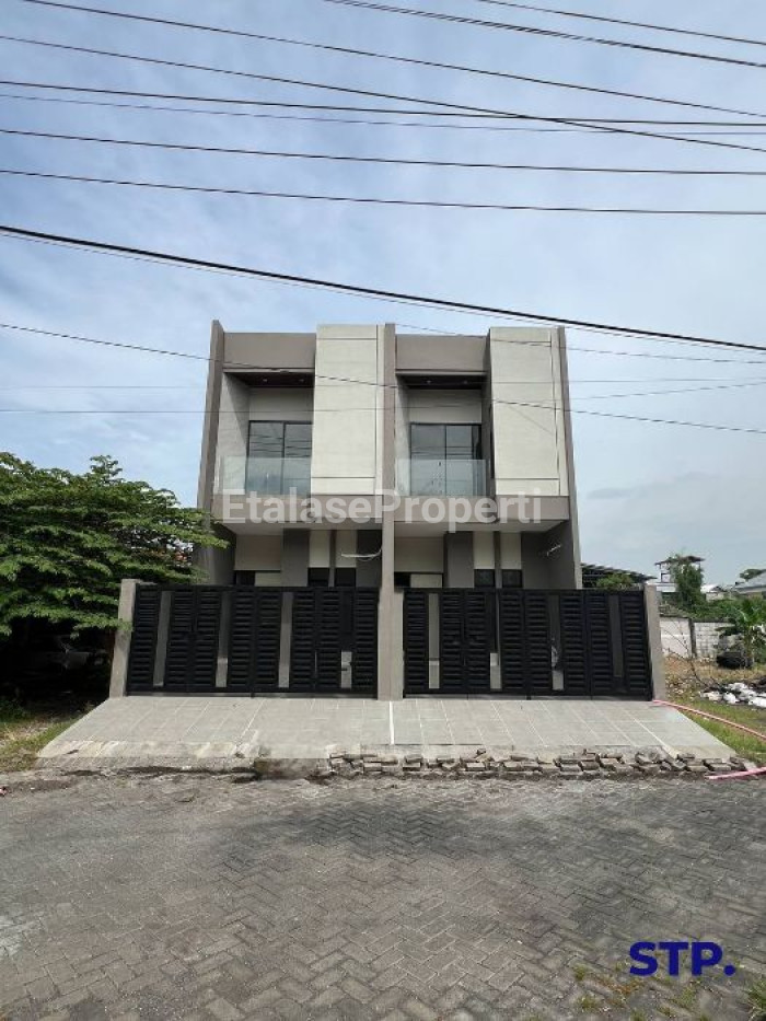 Foto properti Rumah Baru Modern Di Tenggilis Mejoyo Selatan 1