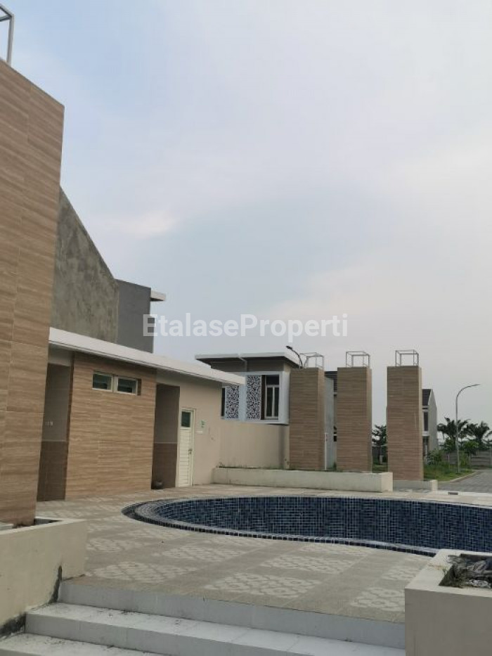 Foto properti Sewa Rumah Baru Semi Furnish 10